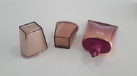 Kosmetik 40ml, die glänzende Beschichtungs-ovales Aluminiumrohr mit Cuspidal Schulter-Acryl-Kappe verpackt